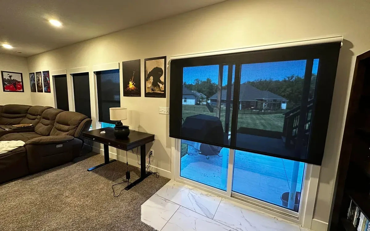 Media room with motorized shade and recessed lighting