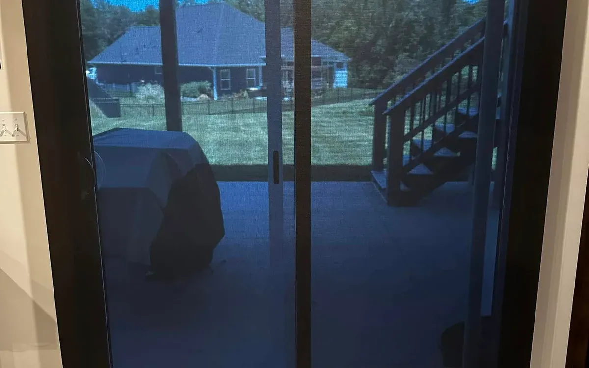 Motorized solar shade on large patio sliding door