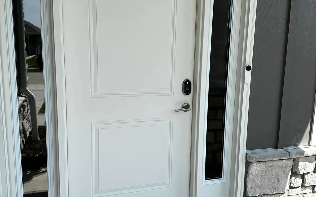 Smart deadbolt lock installed on entry door